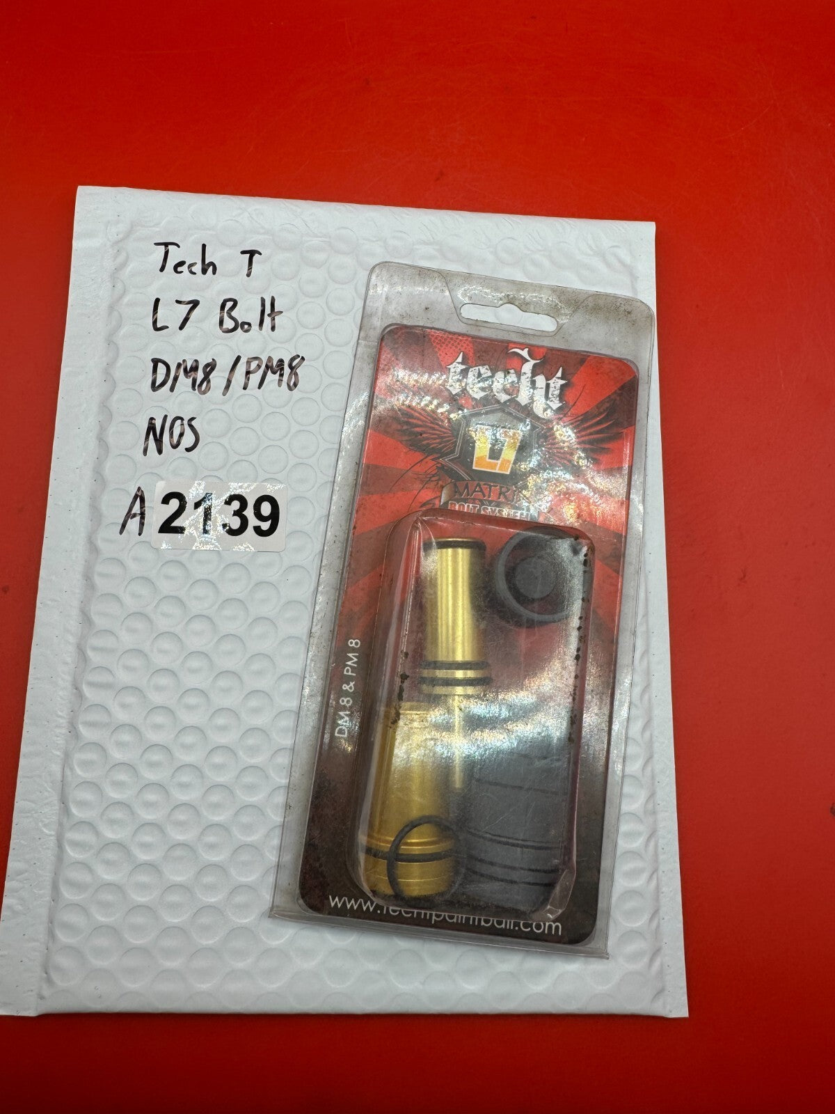 Tech T L7 Bolt DM8/PM8 NOS - used paintball bolt - gold/black
