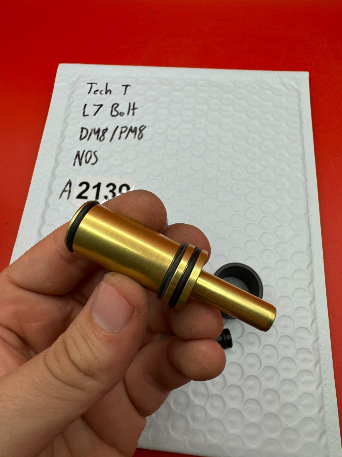 Tech T L7 Bolt DM8/PM8 NOS - used paintball bolt - gold/black