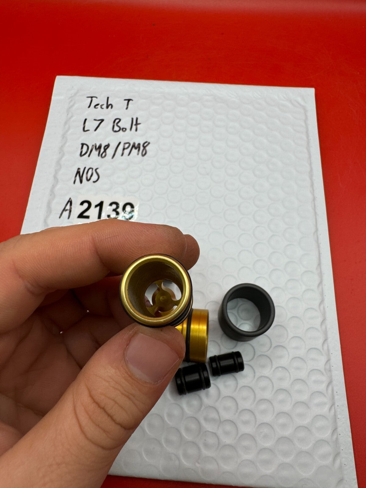 Tech T L7 Bolt DM8/PM8 NOS - used paintball bolt - gold/black