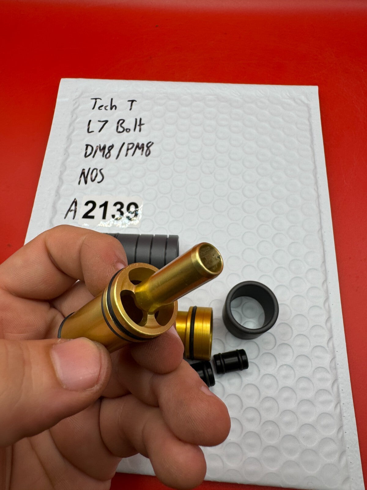 Tech T L7 Bolt DM8/PM8 NOS - used paintball bolt - gold/black