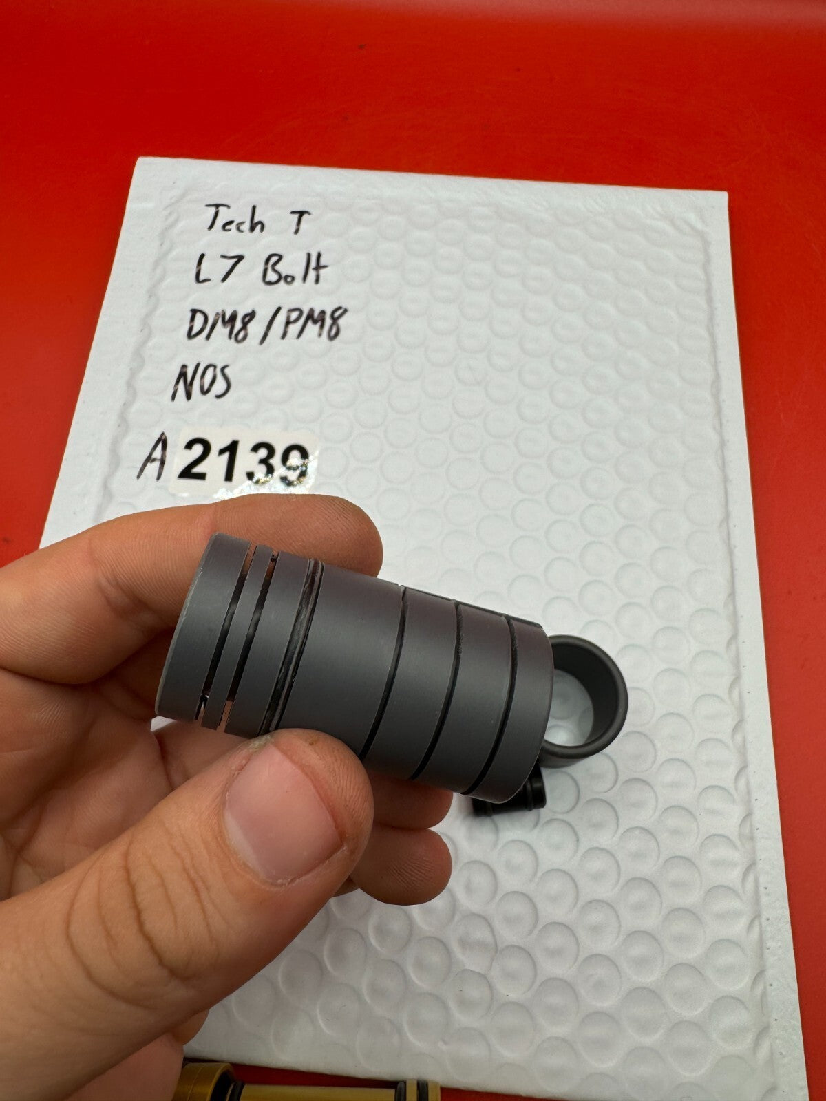 Tech T L7 Bolt DM8/PM8 NOS - used paintball bolt - gold/black