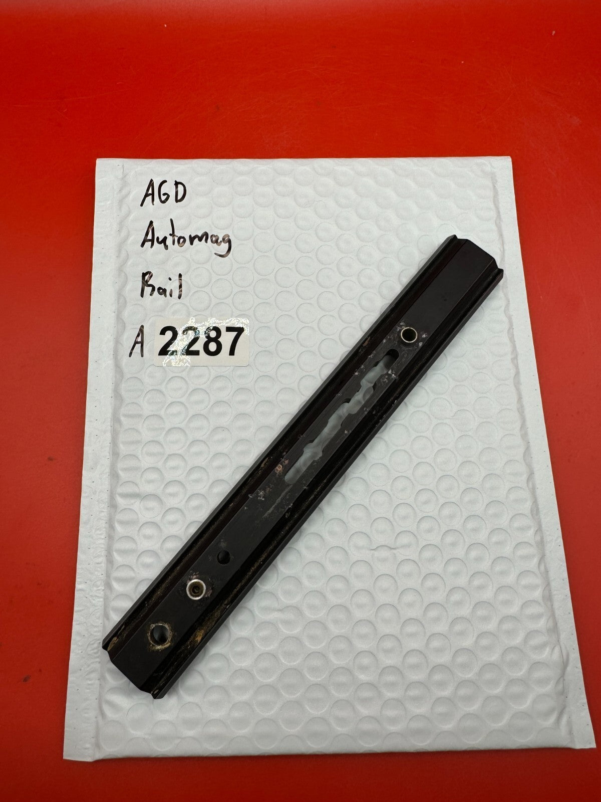AGD Automag Rail - used paintball rail - black