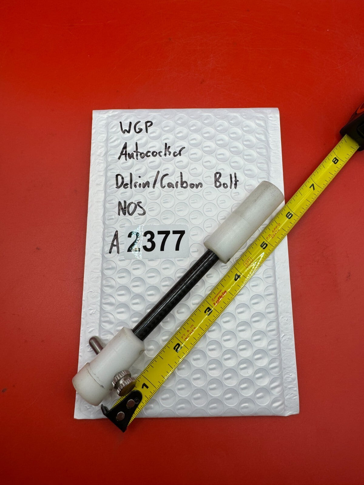 WGP Autococker Delrin/Carbon Bolt NOS White - used paintball bolt - white/black