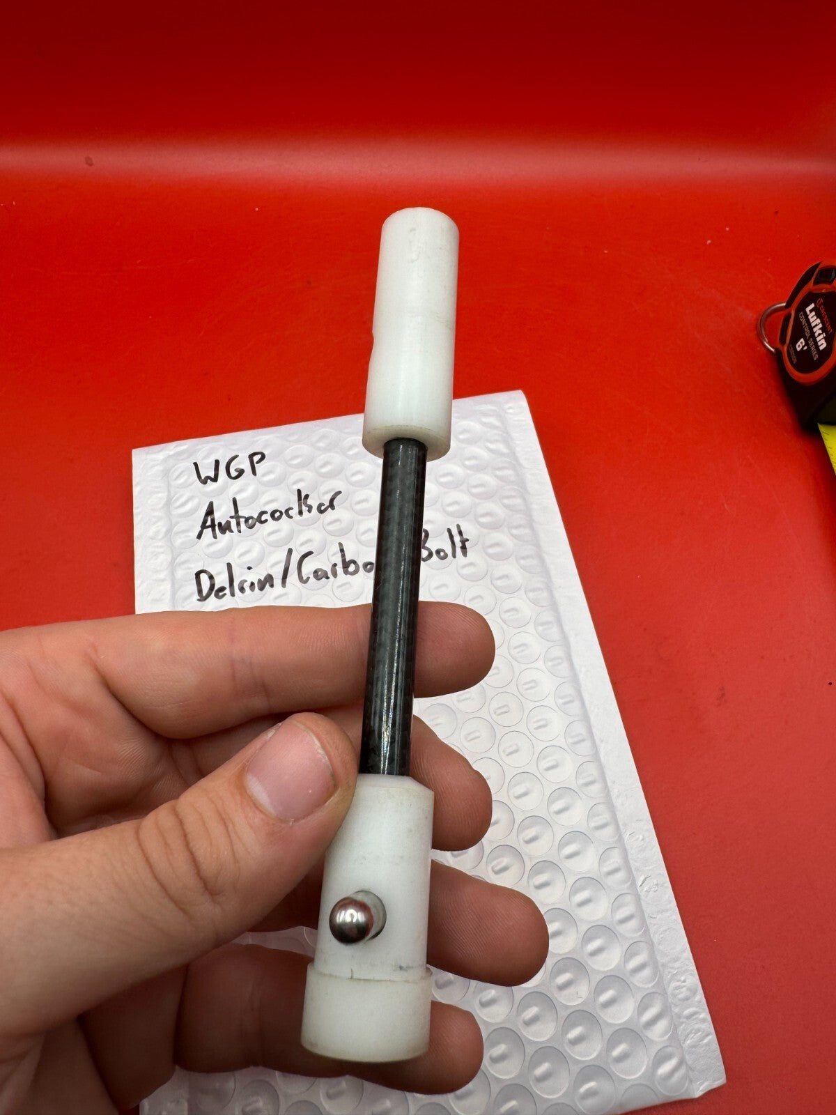 WGP Autococker Delrin/Carbon Bolt NOS White - used paintball bolt - white/black