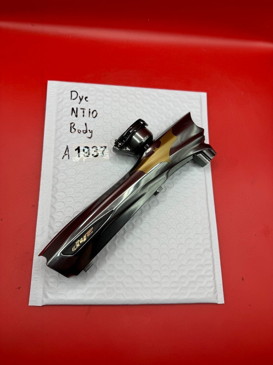 Dye NT10 Body - used paintball marker body - dark red/silver/gold fade