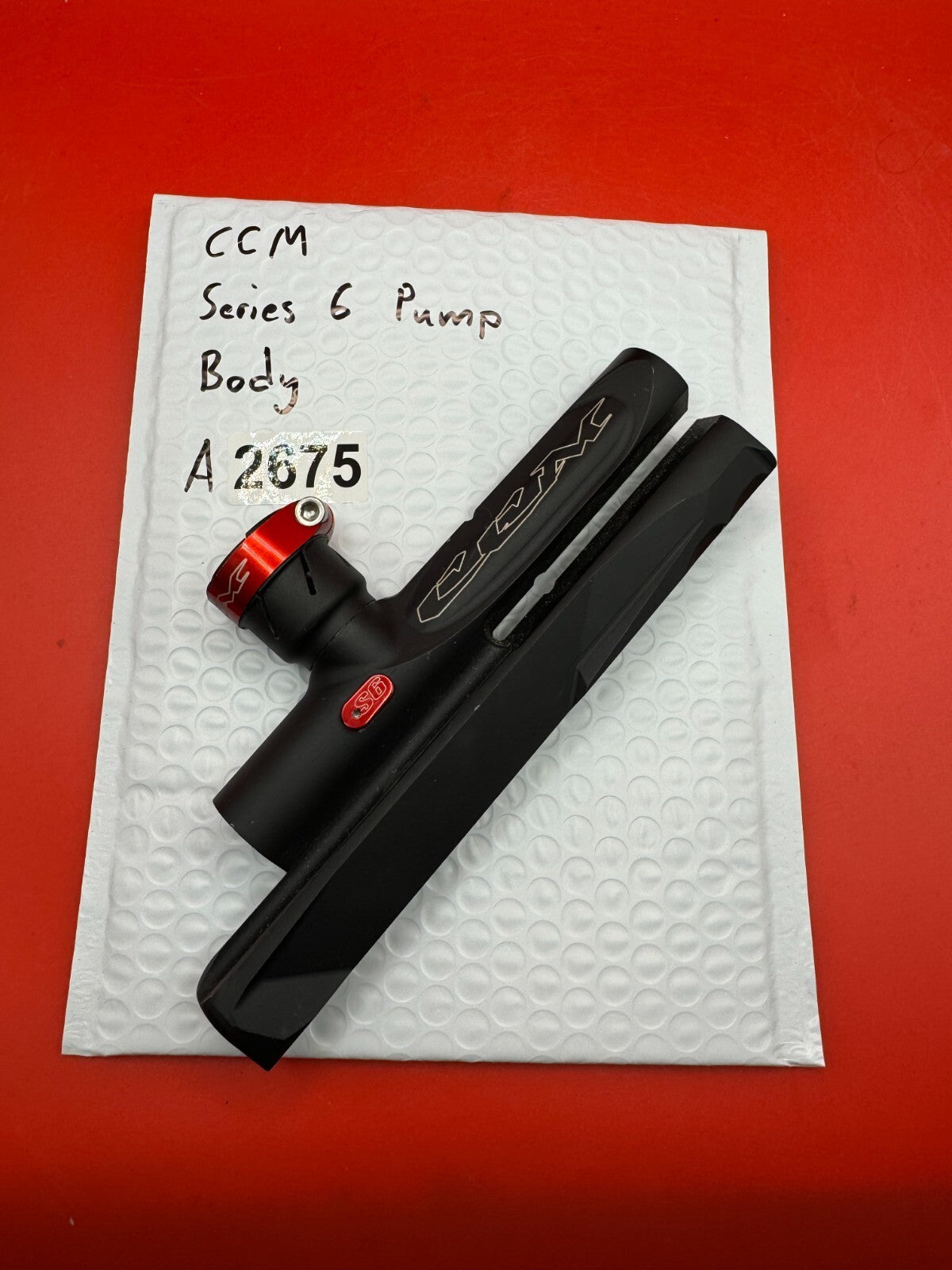 CCM Series 6 Pump Body - used paintball pump body - black/red