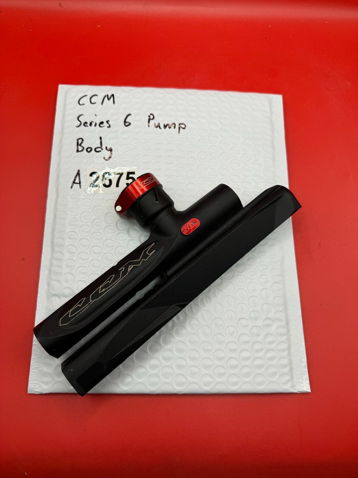 CCM Series 6 Pump Body - used paintball pump body - black/red