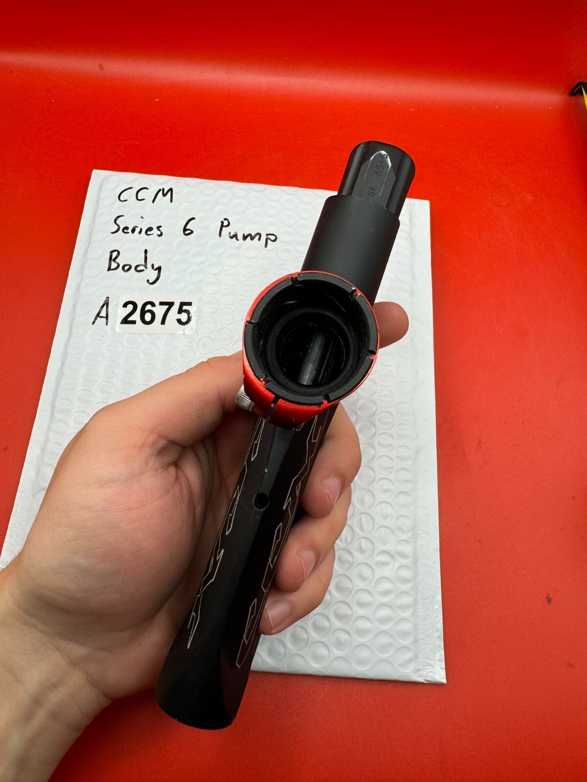 CCM Series 6 Pump Body - used paintball pump body - black/red