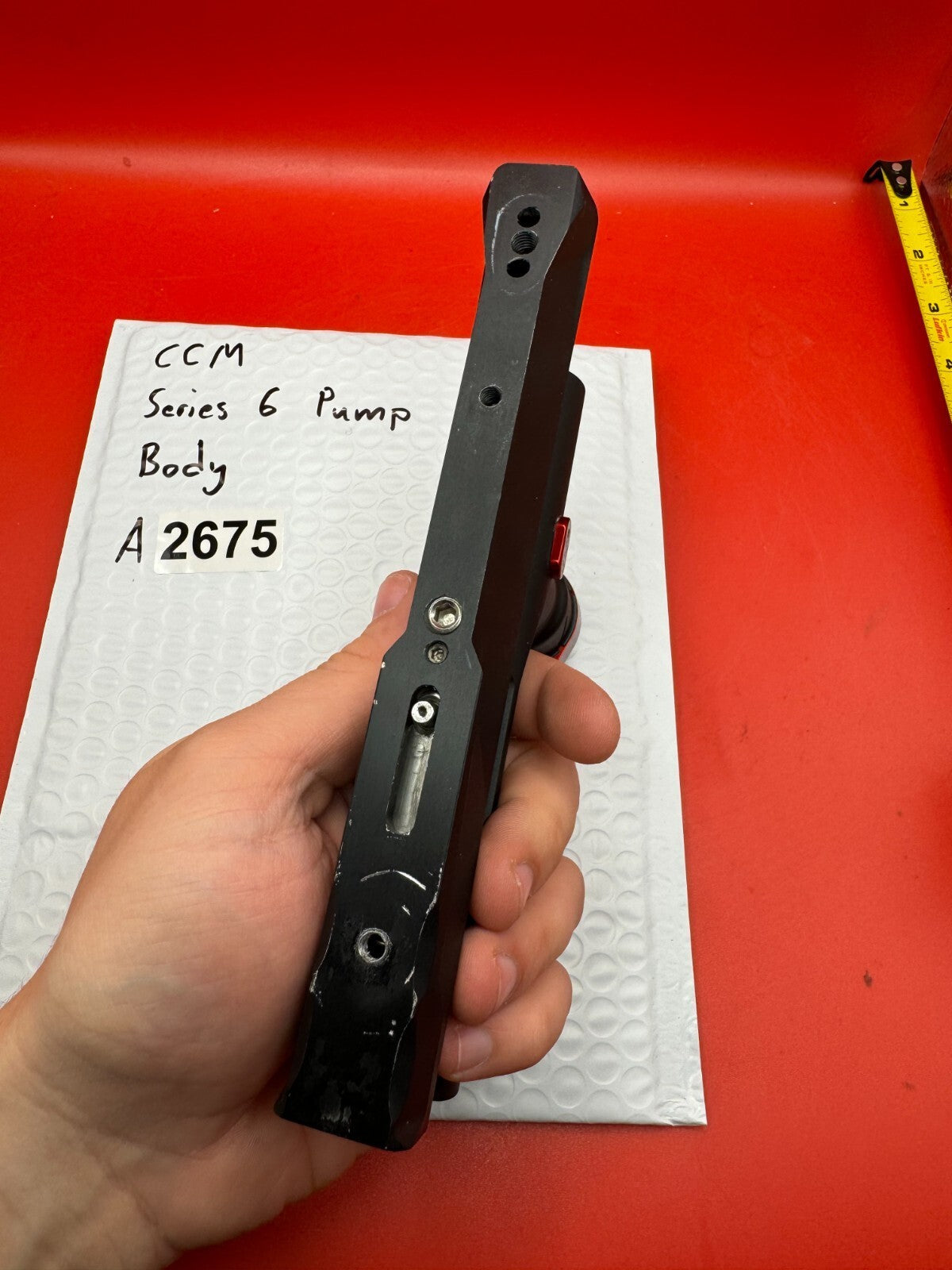 CCM Series 6 Pump Body - used paintball pump body - black/red