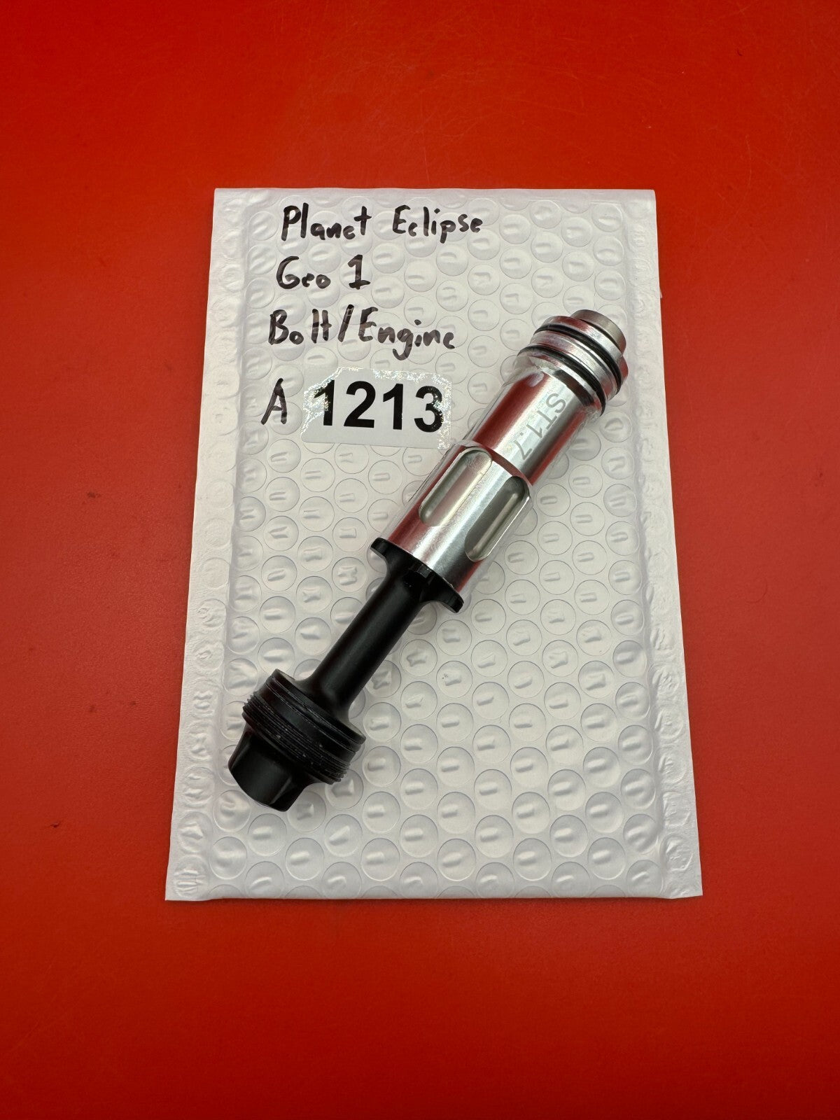 Planet Eclipse Geo 1 Bolt/Engine - used paintball bolt/engine assembly - silver/black/red