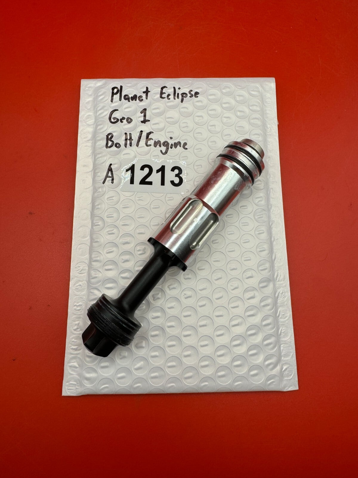Planet Eclipse Geo 1 Bolt/Engine - used paintball bolt/engine assembly - silver/black/red