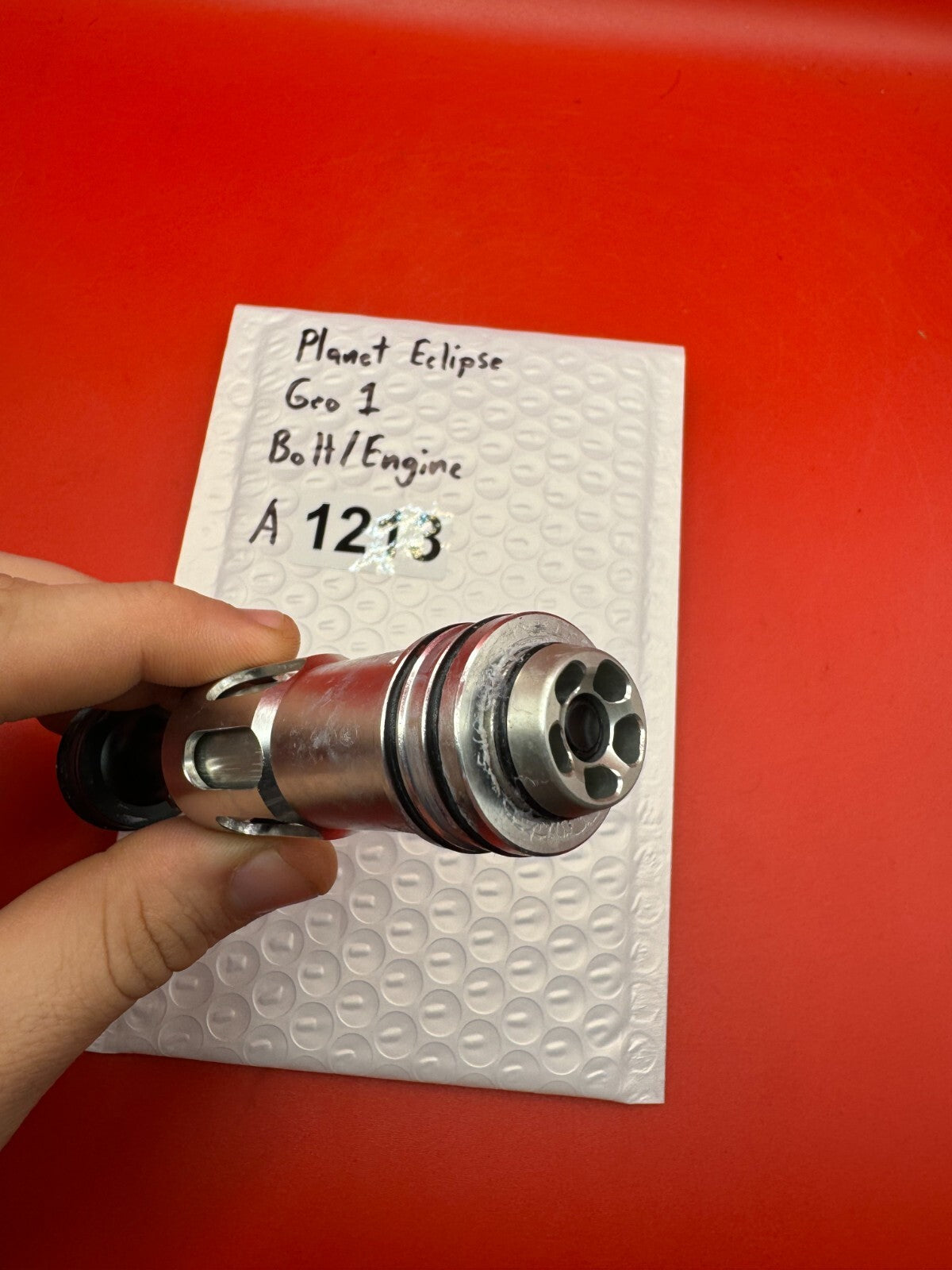 Planet Eclipse Geo 1 Bolt/Engine - used paintball bolt/engine assembly - silver/black/red