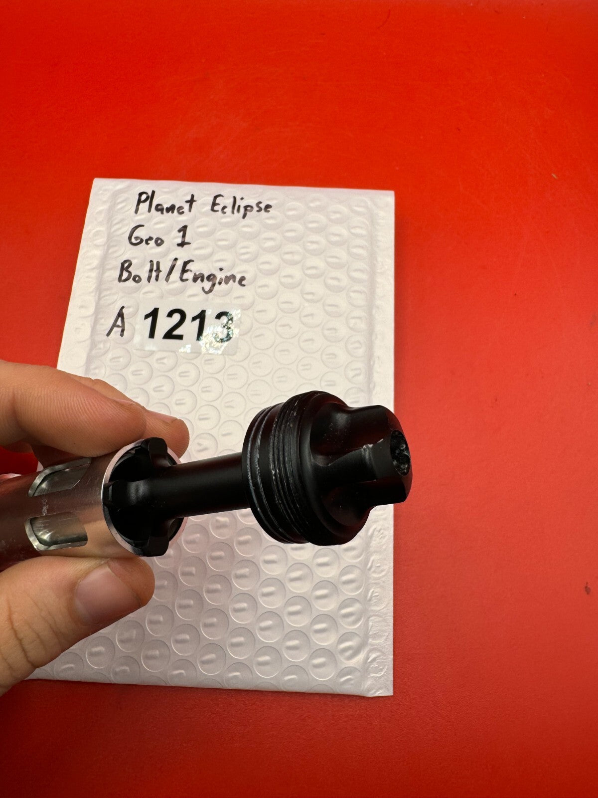 Planet Eclipse Geo 1 Bolt/Engine - used paintball bolt/engine assembly - silver/black/red