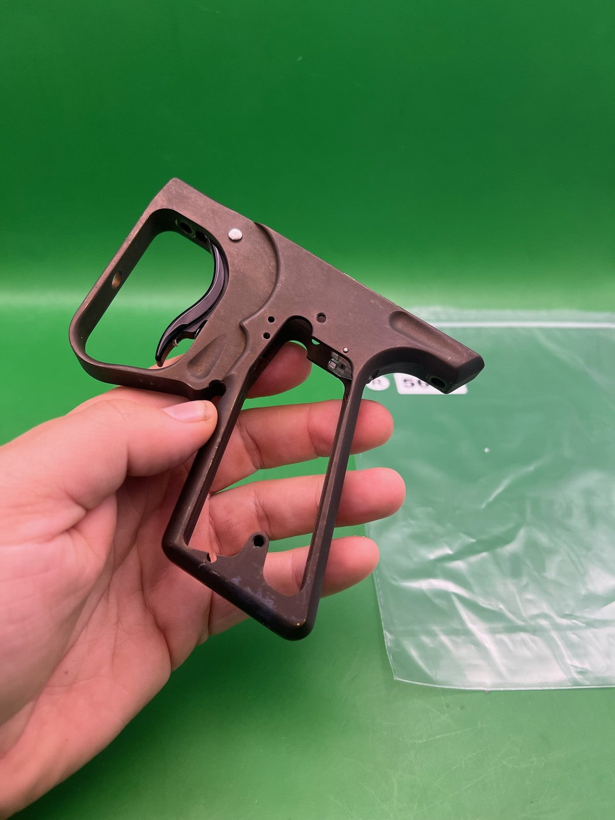 SFT Shocker Frame with Aftermarket Trigger - used paintball trigger frame - dark brown/bronze anno
